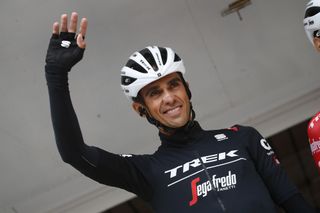 Alberto Contador waves to fans at the Critérium du Dauphiné.