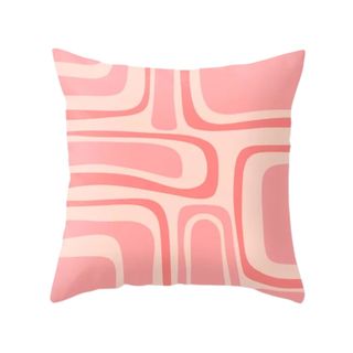 An abstract pink printed midcentury modern throw pillow