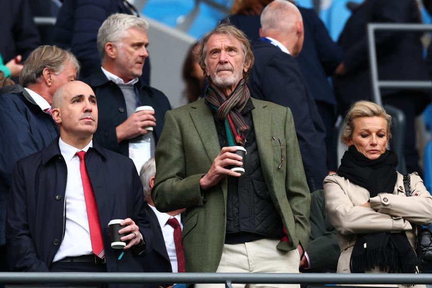 Omar Berrada (L) and Jim Ratcliffe (C) watch the Manchester derby