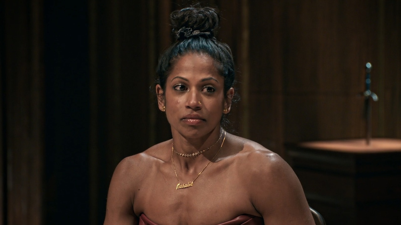 Natalie in a mini dress during her final round table.