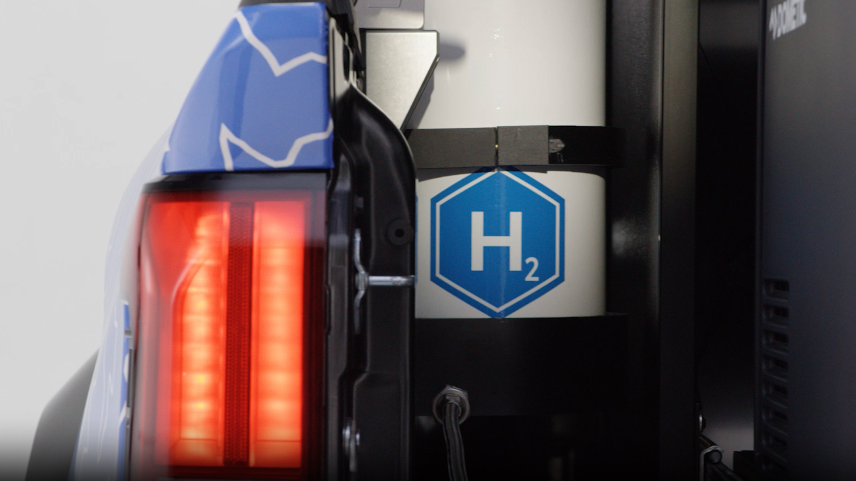 A Tacoma H2-Overlander truck in a studio