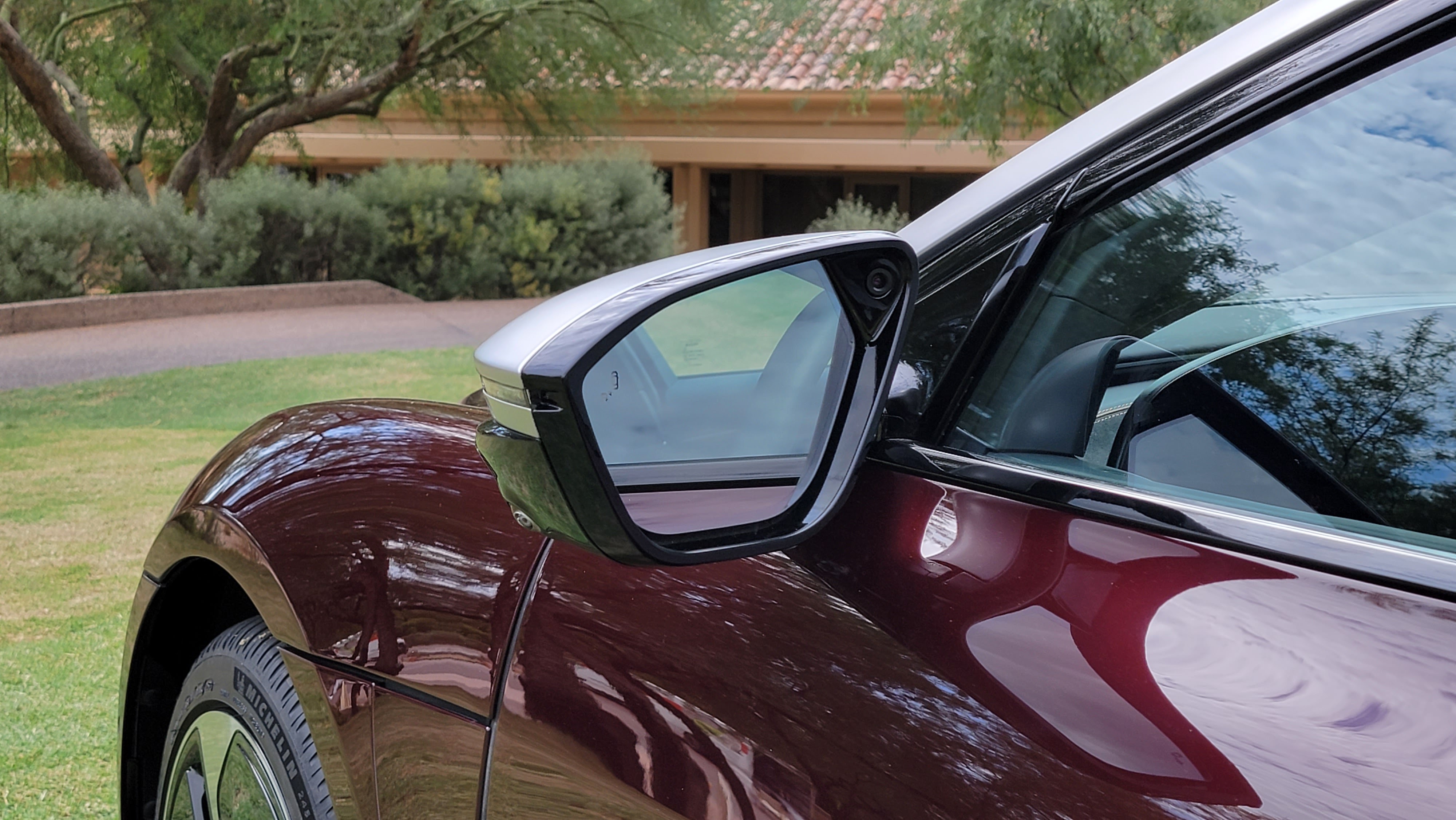 Close-up of side mirror on Lucid Air