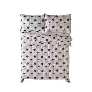 A black and white sun patterned bedding set