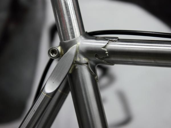 More intricate carving can be found on the seat lug of Ben and Marcie Serotta's unique "La Femme Fatale" steel frame.