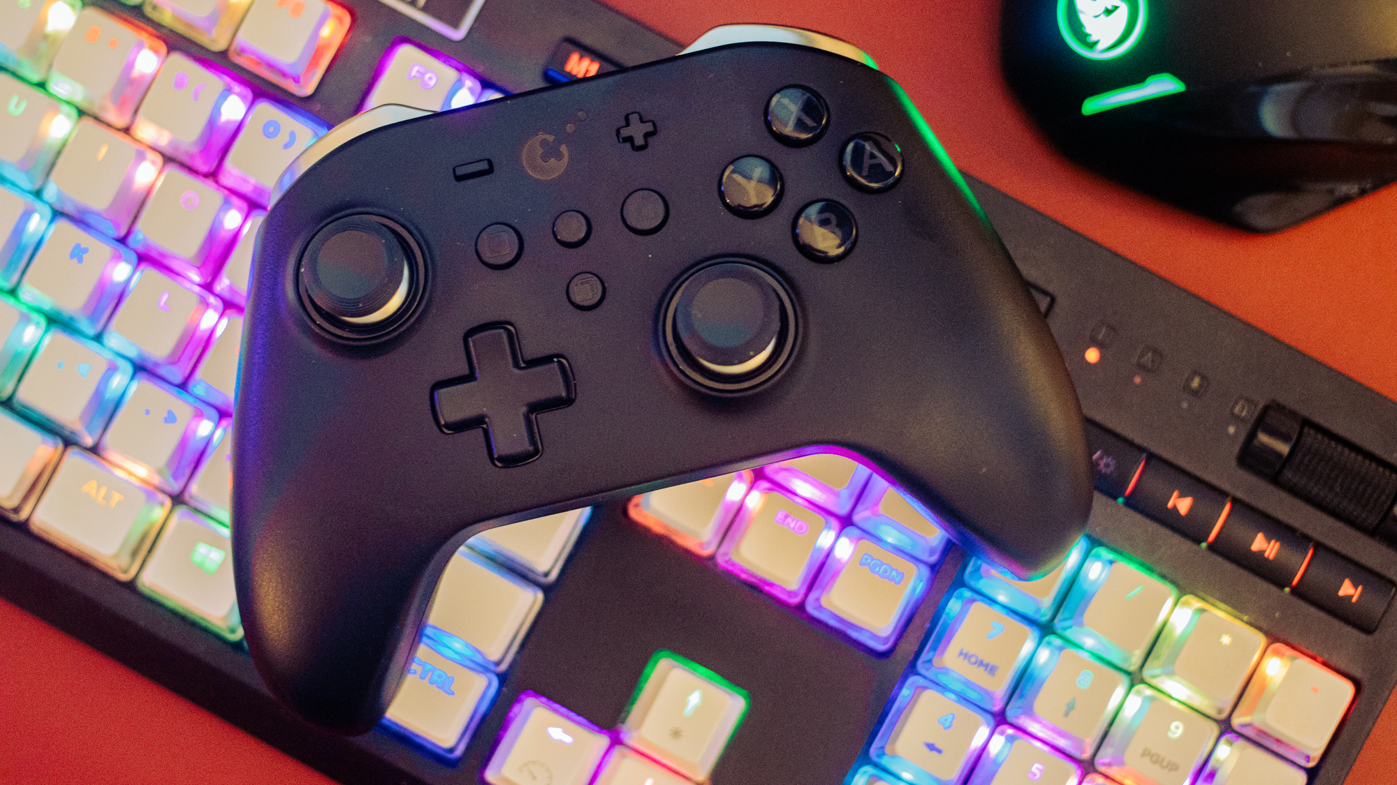 GuliKit KingKong 2 Pro Controller on a keyboard