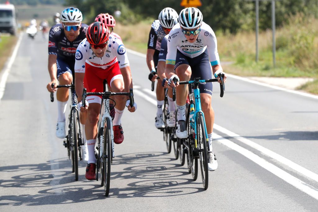 BIELSKOBIALA POLAND AUGUST 13 LR Lukasz Owsian of Poland and Team Poland Reprezentacja Polski Polka Dot Mountain Jersey Yevgeniy Fedorov of Kazakhstan and Team Astana Premier Tech in the Breakaway during the 78th Tour de Pologne 2021 Stage 5 a 173km stage from Chochow Czarny Dunajec to BielskoBiaa 434m TourdePologne TDP2021 UCIWT on August 13 2021 in BielskoBiala Poland Photo by Bas CzerwinskiGetty Images