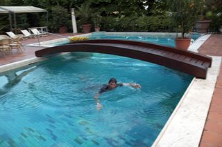 Frank Schleck falls in swimming pool 2