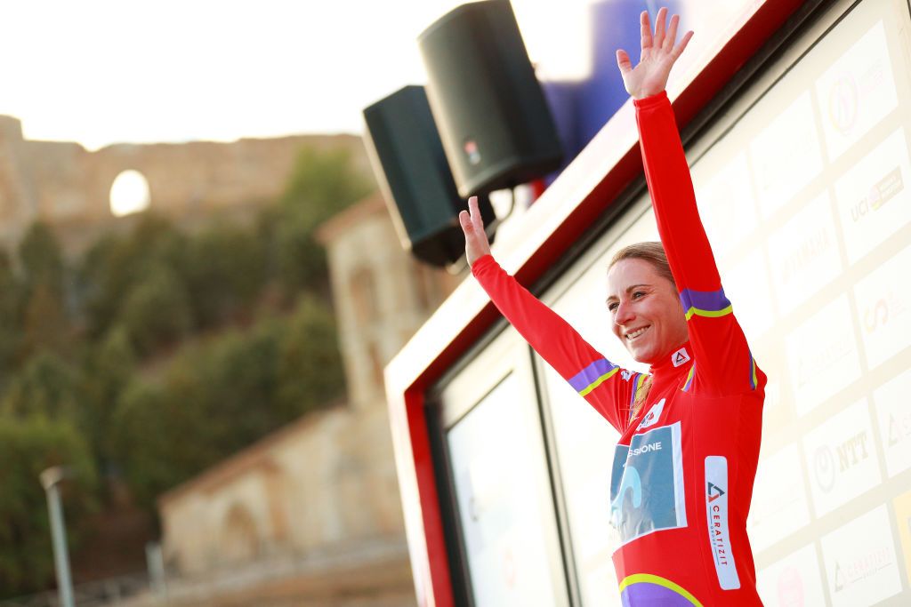 AGUILAR DE CAMPOO SPAIN SEPTEMBER 09 Annemiek Van Vleuten of Netherlands and Movistar Team Women celebrates winning the Red Leader Jersey on the podium ceremony after the 8th Ceratizit Challenge By La Vuelta 2022 Stage 3 a 964km stage from Camargo to Aguilar de Campoo CERATIZITChallenge22 UCIWWT on on September 09 2022 in Camargo Spain Photo by Gonzalo Arroyo MorenoGetty Images