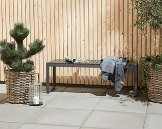 modern garden bench in urban garden