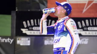 Kevin Harvick celebrates in Victory Lane after winning the NASCAR Cup Series Cook Out Southern 500 at Darlington Raceway on Sept. 6, 2020. He continues to lead the Cup Series standings heading into the playoffs' round of 12.