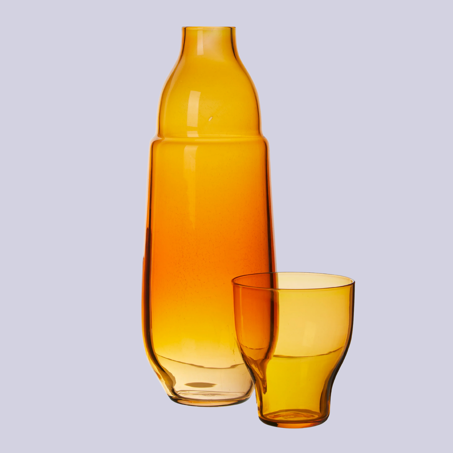 A yellow carafe and tumbler