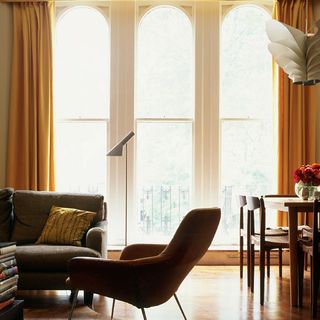living room with sofa and floor lamp
