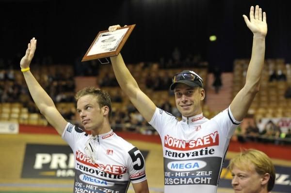 Iljo Keisse looks disappointed as partner Roger Kluge smiles at the presentation.