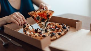 Pizza in cardboard box