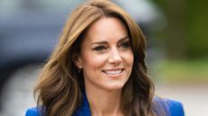 Kate Middleton's handshakes - Catherine, Princess of Wales smiles and wears a blue blazer during a visit to SportsAid at Bisham Abbey National Sports Centre to mark World Mental Health Day on October 12, 2023 in Marlow, England.