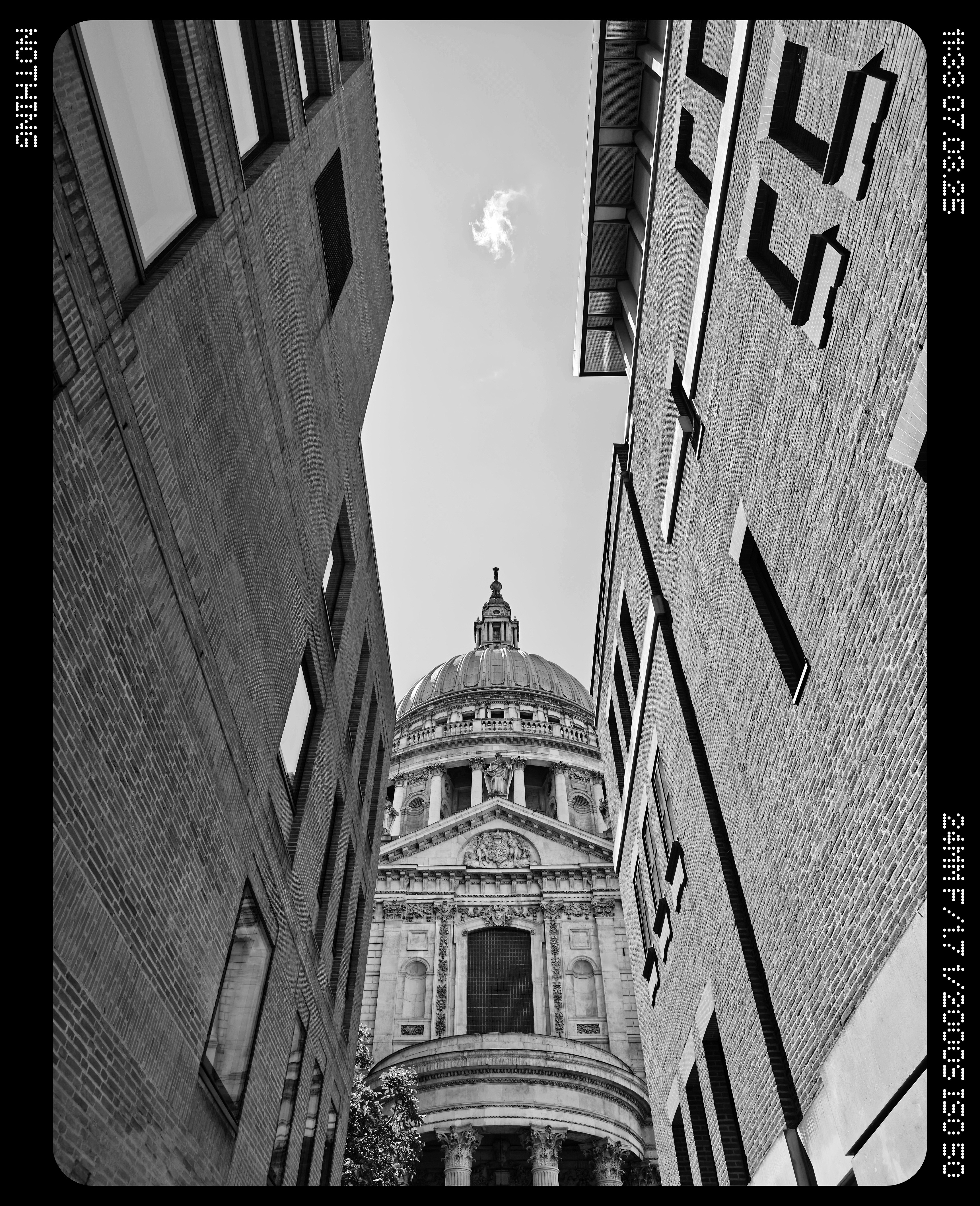 Saint Paul's Cathedral scene between two office buildings