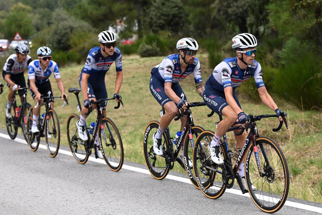 GUADARRAMA SPAIN SEPTEMBER 16 LR Remco Evenepoel of Belgium Polka dot Mountain Jersey Louis Vervaeke of Belgium Mattia Cattaneo of Italy and James Knox of The United Kingdom and Team Soudal Quick Step compete in the breakaway during the 78th Tour of Spain 2023 Stage 20 a 2078km stage from Manzanares El Real to Guadarrama UCIWT on September 16 2023 in Guadarrama Spain Photo by Tim de WaeleGetty Images