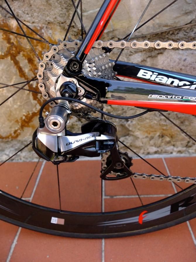 Chunky chain stays join Ultra Thin Seat Stays at the dropout, and the Di2 wiring exits below