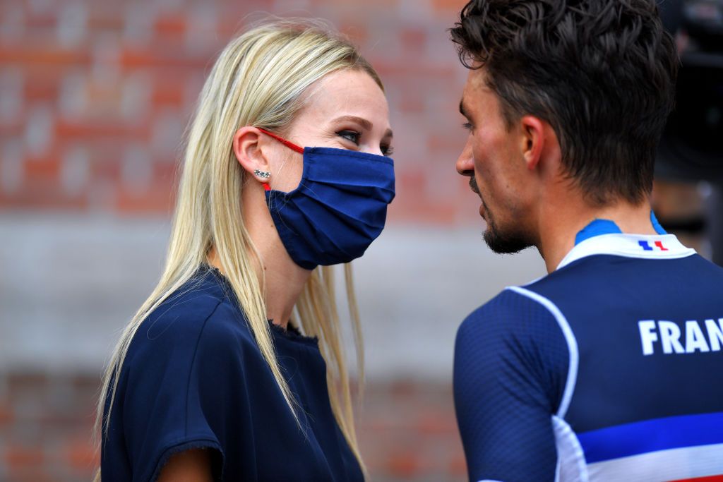 LEUVEN BELGIUM SEPTEMBER 26 Julian Alaphilippe of France celebrates with his mate Marion Rousse of France after win the 94th UCI Road World Championships 2021 Men Elite Road Race a 2683km race from Antwerp to Leuven flanders2021 on September 26 2021 in Leuven Belgium Photo by Luc ClaessenGetty Images