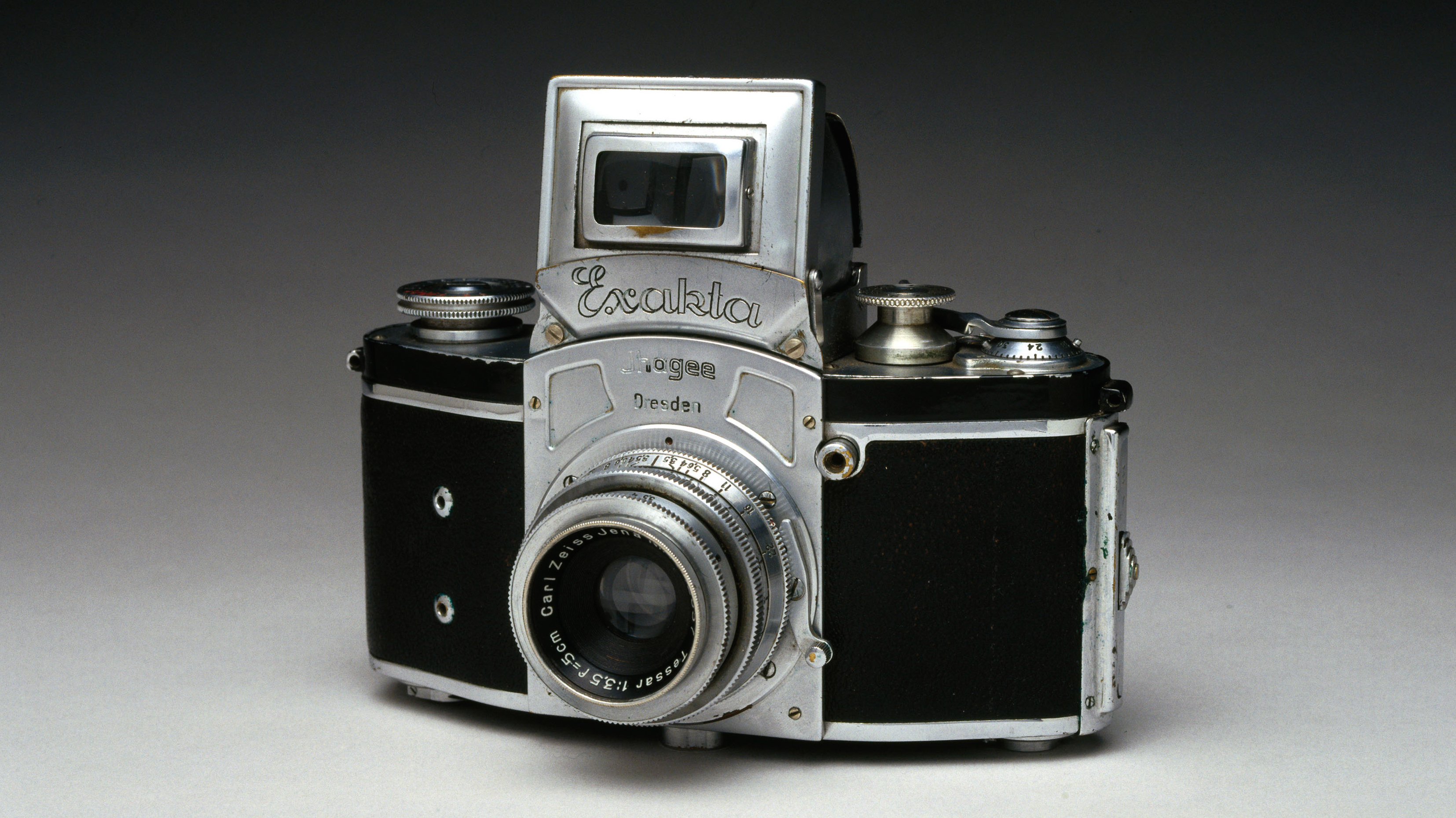 GERMANY - JULY 04: By the 1930s, new miniature cameras were on the market. They were light, convenient to carry, and could be used quickly and unobtrusively. They became popular with a new breed of photojournalist. The Exacta was the first of its type and is the direct ancestor of all modern 35mm SLRs. Manufactured by Ihagee Kamera Werk, Dresden, Germany. (Photo by SSPL/Getty Images)
