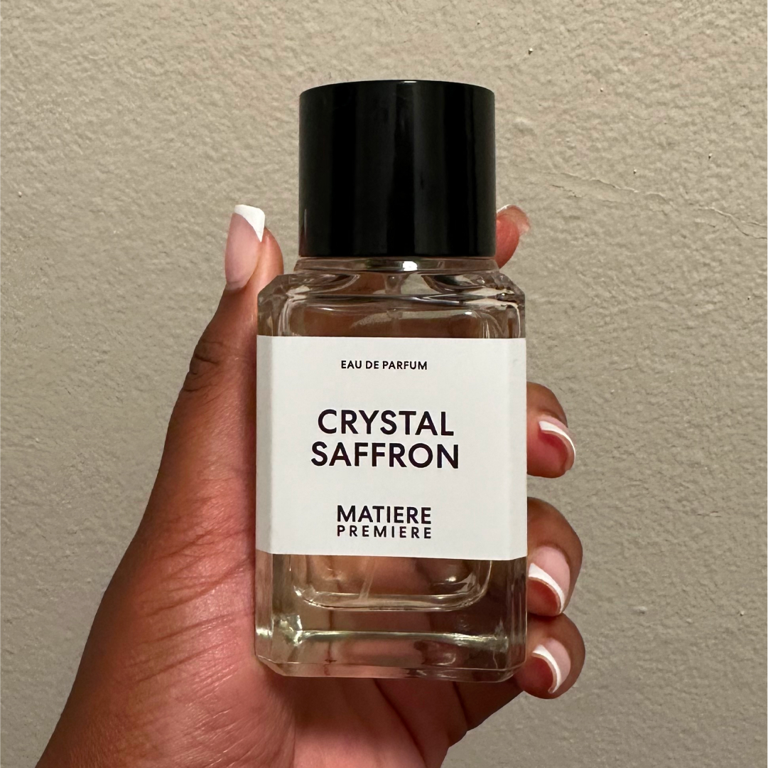 Ariel Baker testing Crystal Saffron perfume.