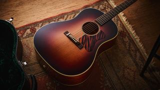Bourgeois Slope D Standard T/S: Inspired by the J-45, this Touchstone series acoustic has. a beautiful high-gloss finish with a tiger-stripe pickguard