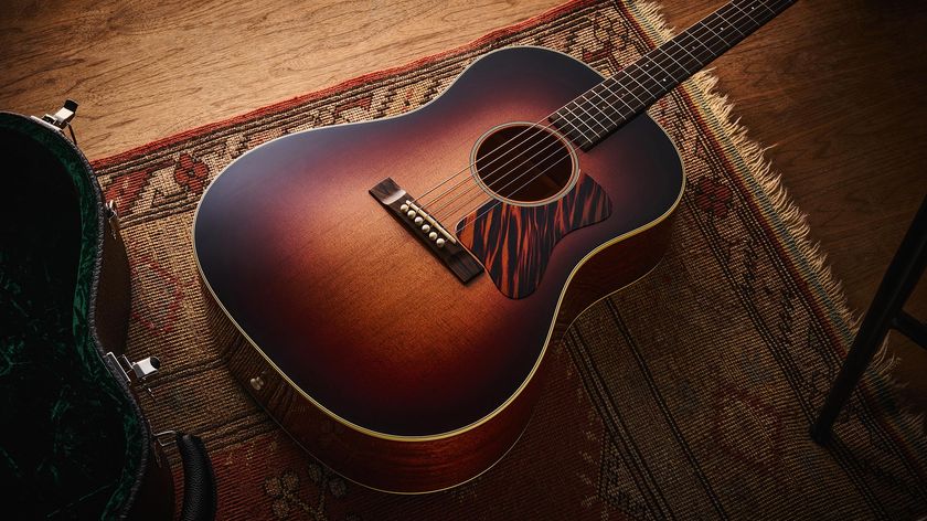 Bourgeois Slope D Standard T/S: Inspired by the J-45, this Touchstone series acoustic has. a beautiful high-gloss finish with a tiger-stripe pickguard