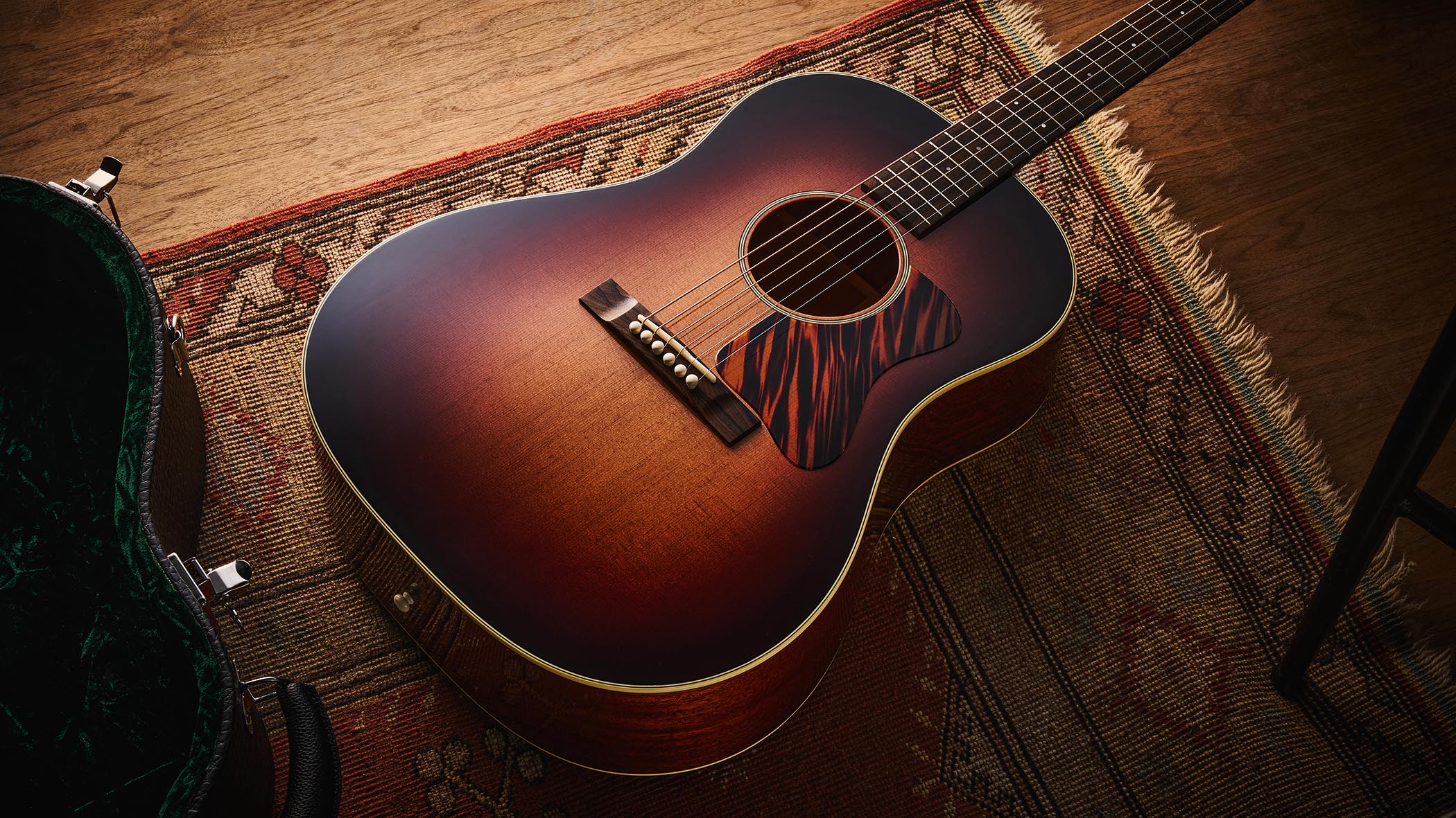 Bourgeois Slope D Standard T/S: Inspired by the J-45, this Touchstone series acoustic has. a beautiful high-gloss finish with a tiger-stripe pickguard