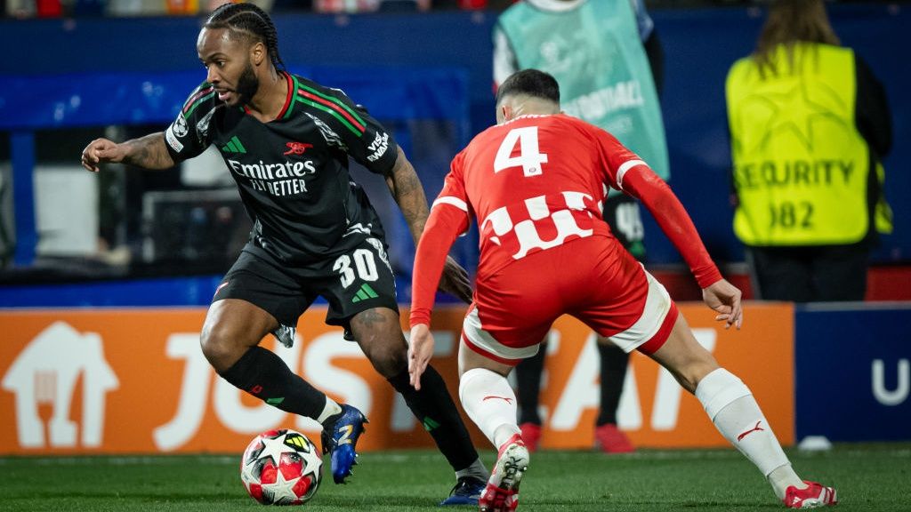 Raheem Sterling (Arsenal FC) and Arnau Martinez (Girona FC) seen in action during a UEFA Champions League match between Girona FC and Arsenal FC at Estadi Municipal de Montilivi. Final Score Girona FC 1 : 2 Arsenal FC.