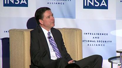FBI Director James Comey doesn't take "sides," he says