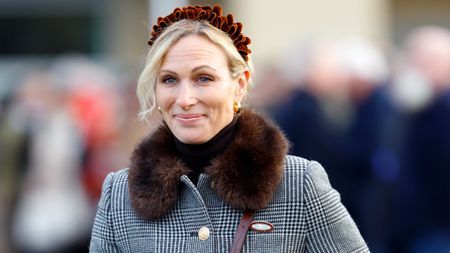 Zara Tindall, wearing a checked LK Bennett coat, attends Festival Trials Day at Cheltenham Racecourse on January 25, 2025