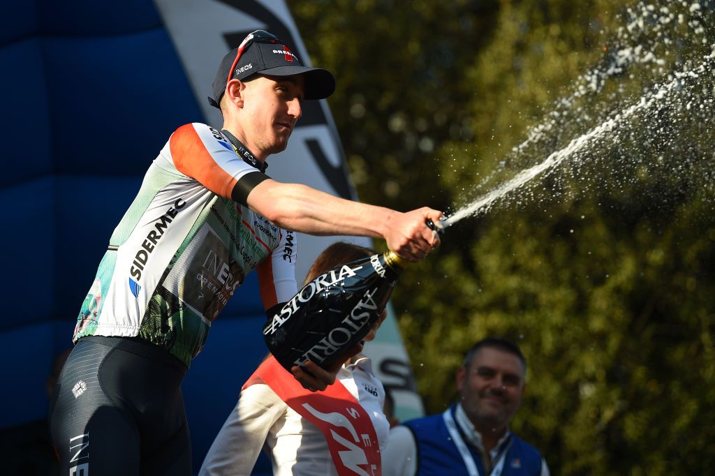 MONTECATINI TERME ITALY MARCH 25 Eddie Dunbar of Ireland and Team INEOS Grenadiers White Leader Jersey celebrates at podium with champagne during the 36th Settimana Internazionale Coppi e Bartali 2022 Stage 4 a 1587km stage from Montecatini to Montecatini CoppieBartali on March 25 2022 in Montecatini Terme Italy Photo by Dario BelingheriGetty Images