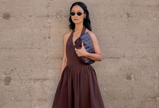 Woman in brown dress.