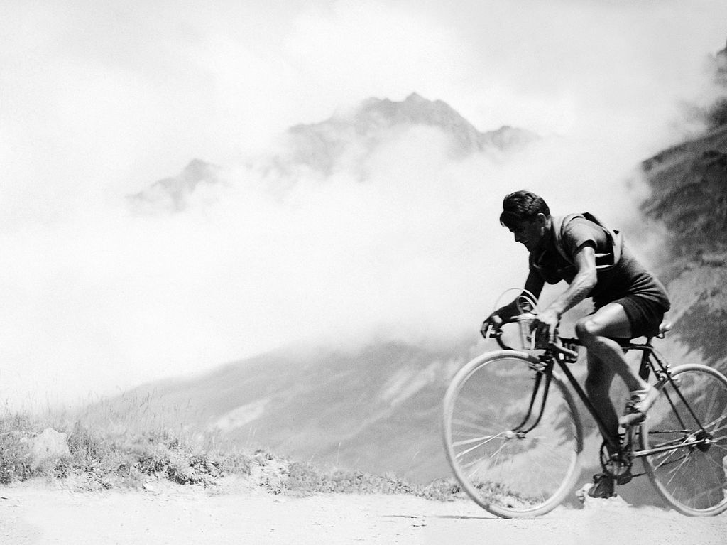 Spanish cyclist Vicente Trueba climbs the mountain pass of the Tourmalet Col du Tourmalet on July 17 1933 during the 18th stage of the 27th Tour de France between Tarbes and Pau Trueba finished 7th of the stage won by Italian rider Learco Guerra but became the first winner of the King of the Mountain competition Frenchman Georges Speicher won the Tour de France as Trueba finished 6th in the overall rankings AFP PHOTO Photo credit should read AFP via Getty Images
