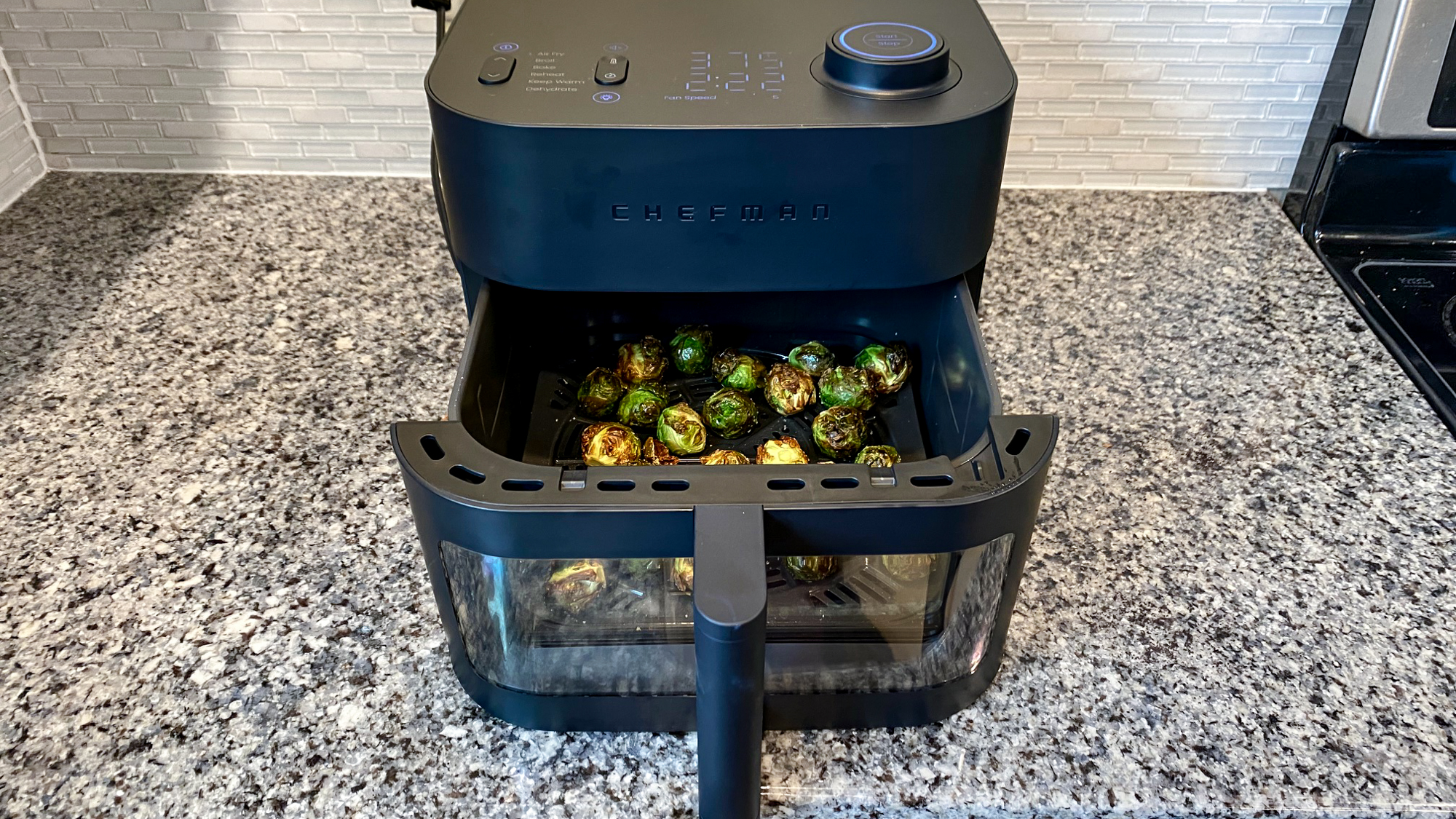 The Chefman Crispinator cooking brussel sprouts