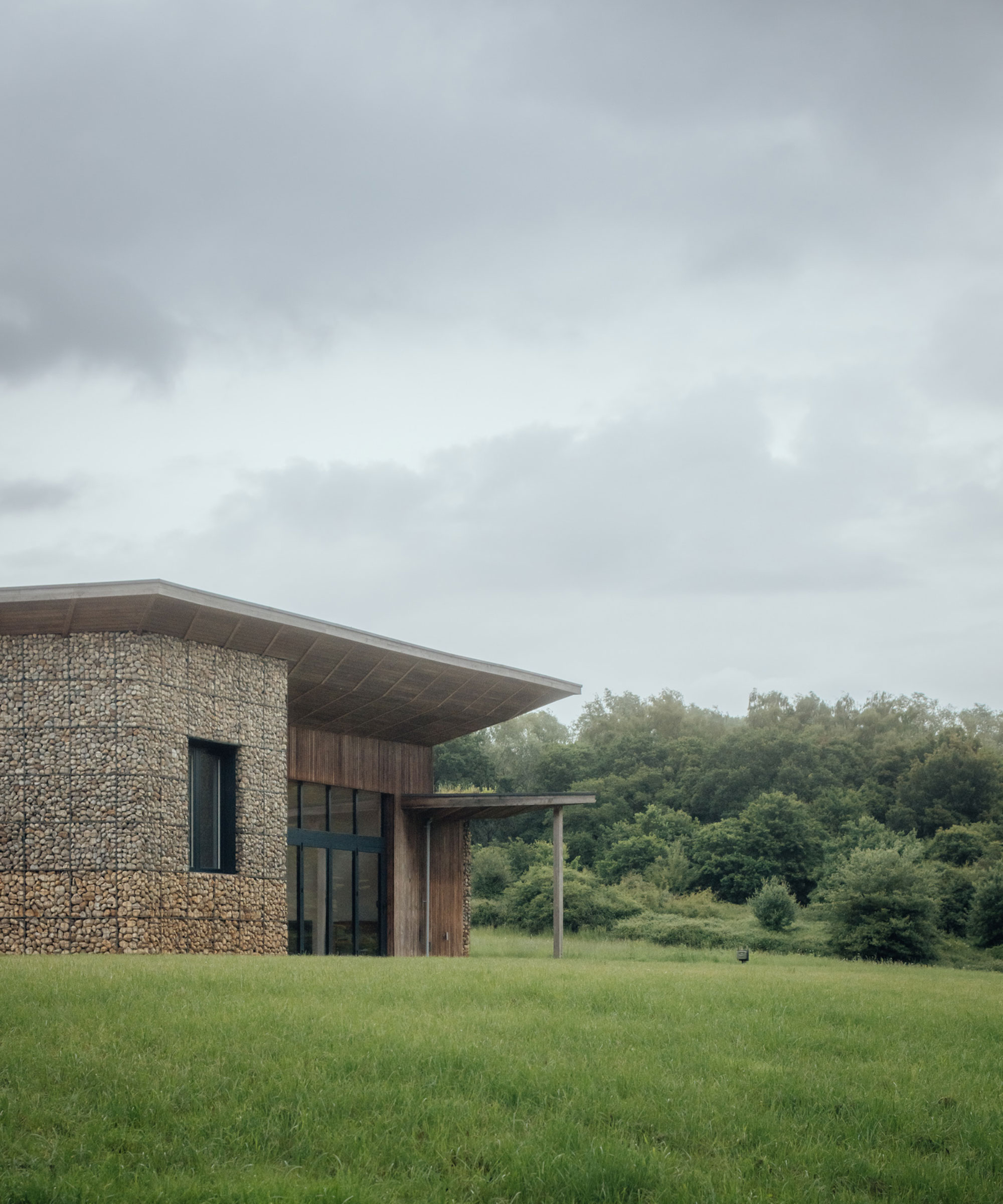 modern stone house with modern porch