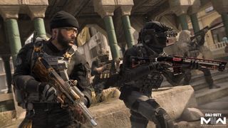 Captain Price and another soldier run while holding weapons
