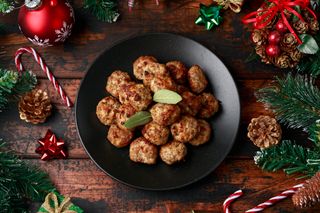 Close up of stuffing balls in a bowl on a Christmas table