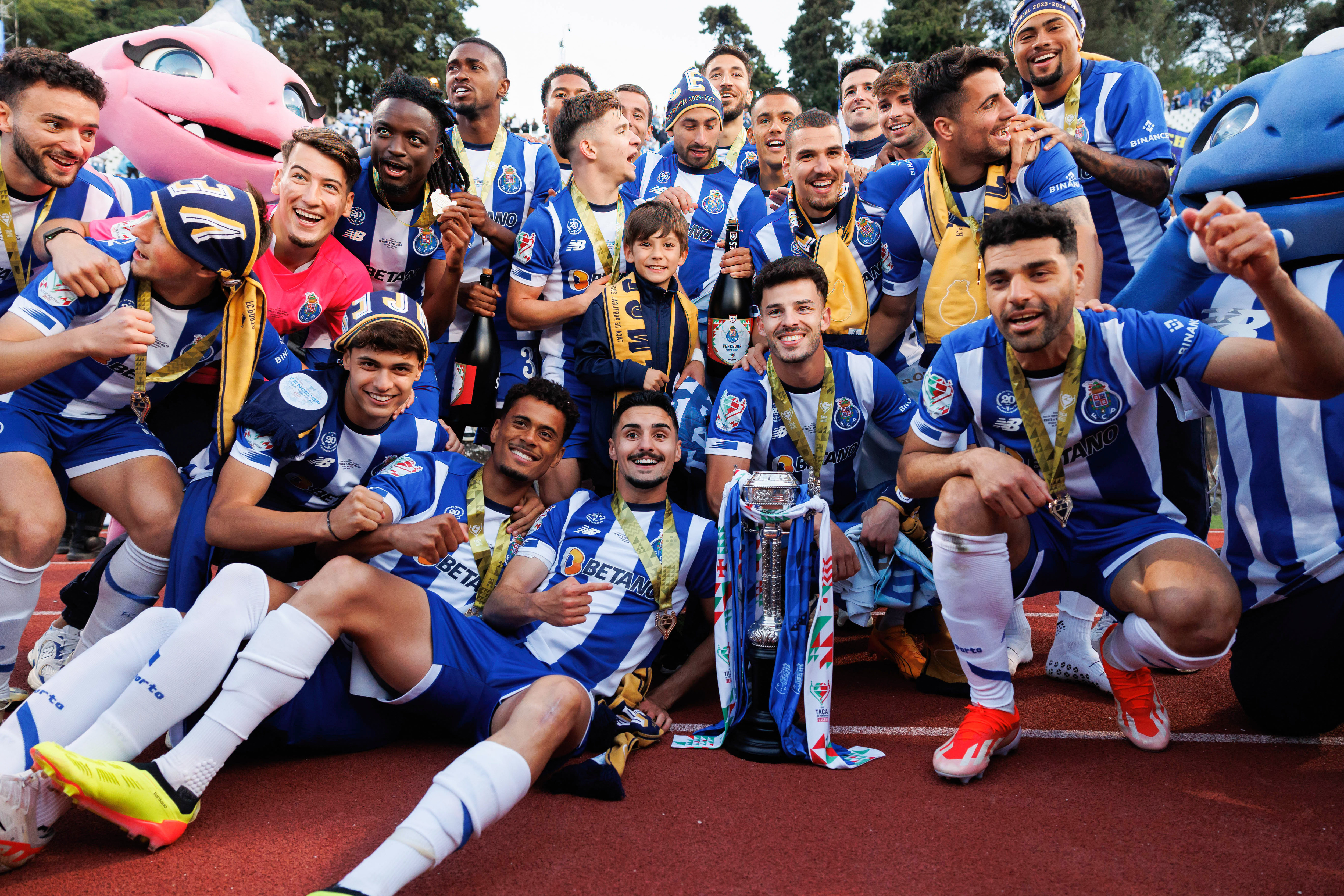 Porto players celebrate with the Taça de Portugal trophy after beating Sporting CP in the final in May 2024.