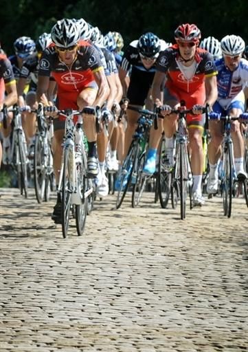 Radioshack leads through the cobbles.