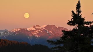 Moonrise over the rocky mountains