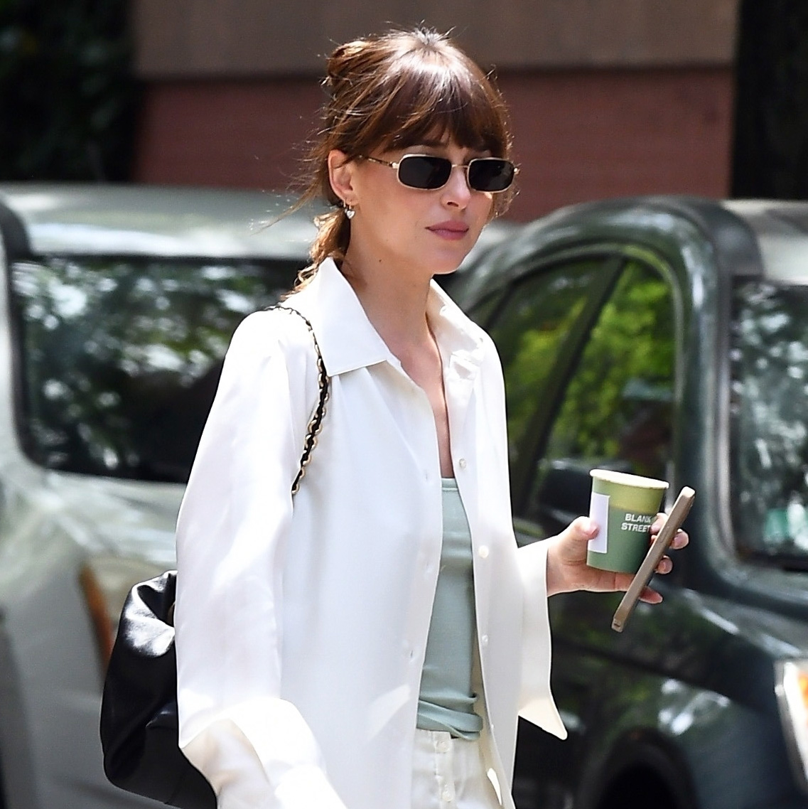 Dakota Johnson Wore the Un-Trendy Shoe Style Everyone Is Wearing With Skirts