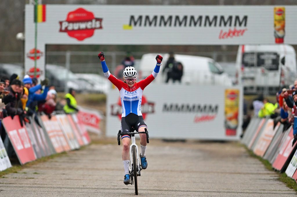 ZONHOVEN BELGIUM JANUARY 07 Puck Pieterse of The Netherlands and Team FenixDeceuninck celebrates at finish line as race winner during the 27th Zonhoven UCI CycloCross Worldcup 2024 Womens Elite on January 07 2024 in Zonhoven Belgium Photo by Luc ClaessenGetty Images
