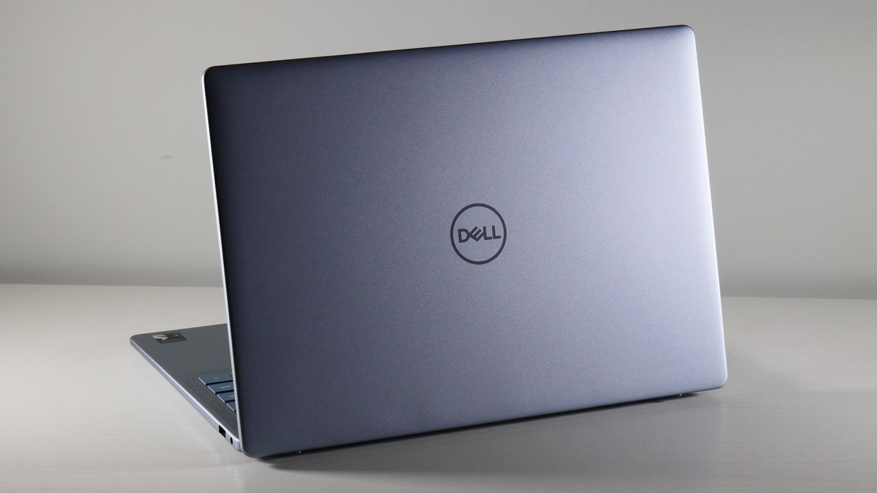 Dell Inspiron 14 Plus 7441 (Snapdragon X Plus) facing away showing the lid with Dell logo.