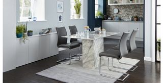 marble table with dining chairs by DFs