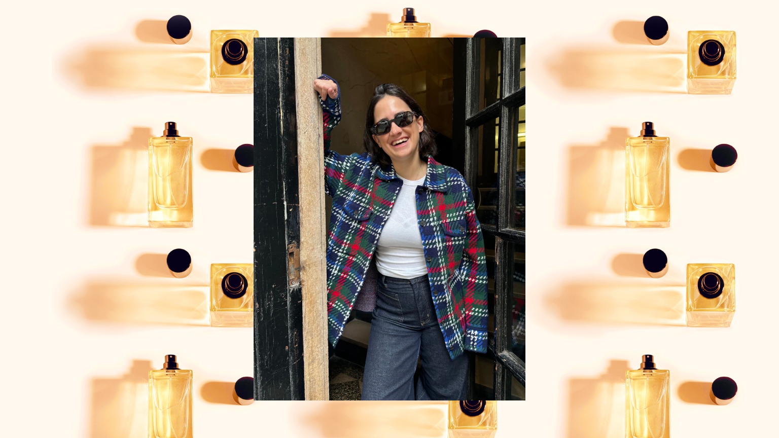a woman in a plaid jacket and sunglasses with dark hair over a gold and black perfume bottle design