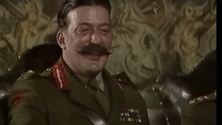 Blackadder's Stephen Fry laughing as General Melchett