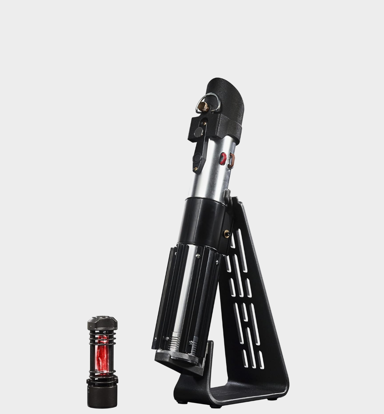 The Black Series Force FX Elite Darth Vader hilt and crystal on a plain background