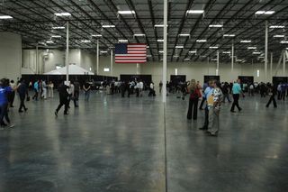 Job seekers lined up at specialty stations inside Virgin Galactic's new LauncherOne facility, which opened in Long Beach, California, last Saturday. The crowd was estimated to be almost 7,000 strong.
