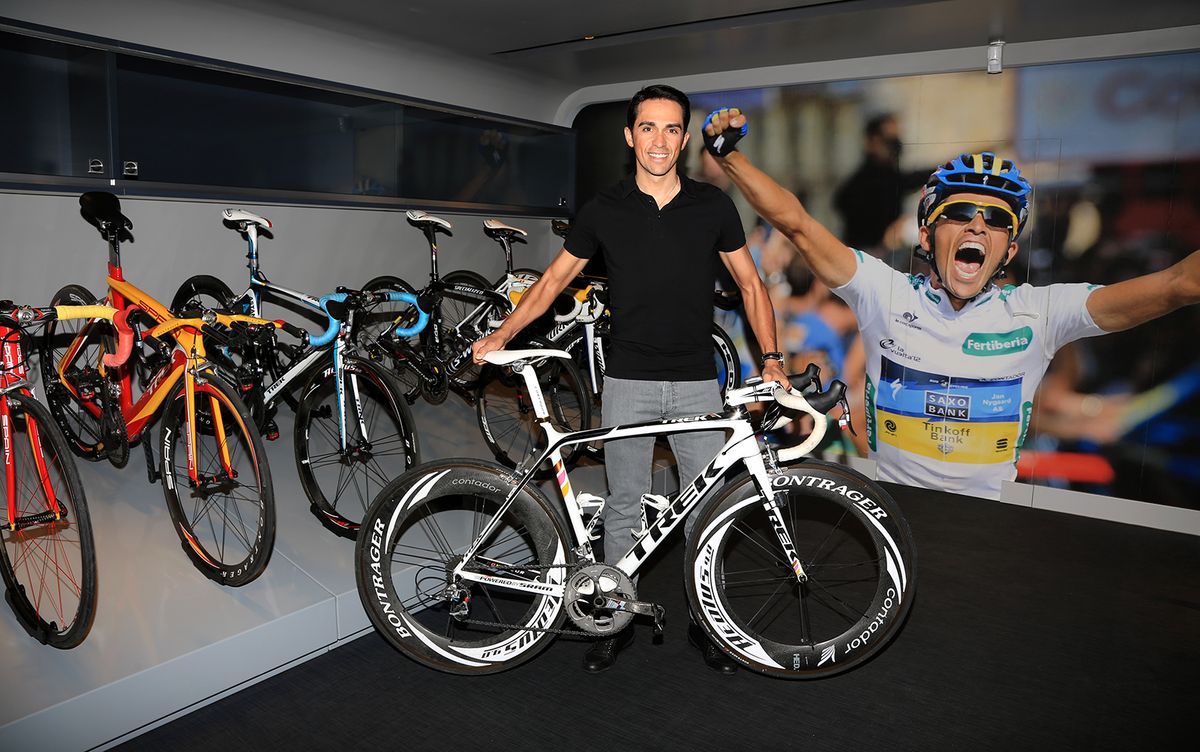 Contador shows off his favourite bike, a custom Trek from 2009 highlighting his victories in all three Grand Tours